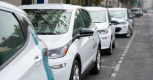Row of Parked Car Sharing Chevy Bolt EVs at the Blink Mobility Hoover Jefferson Station