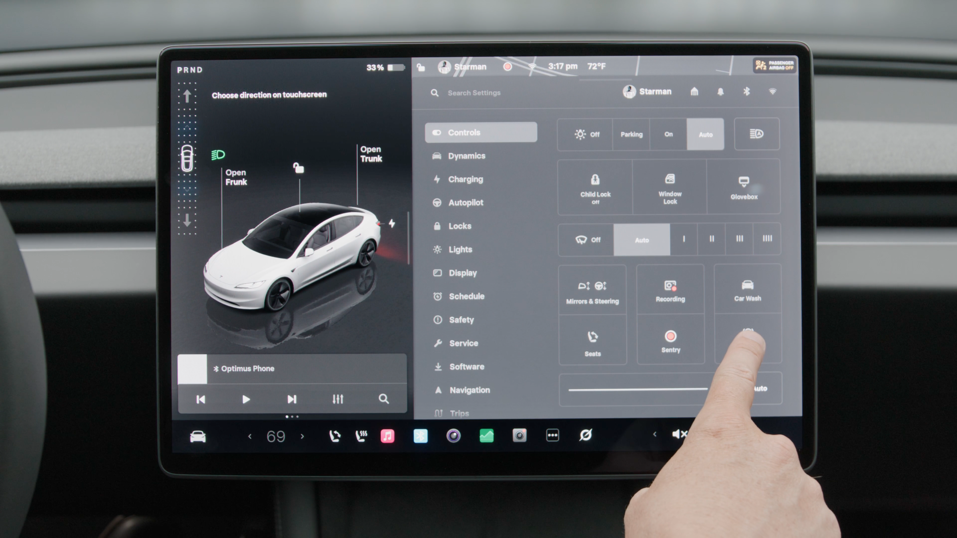 Pressing the Neutral button on the Tesla center console